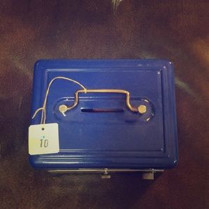 Blue metal cash box with dial.